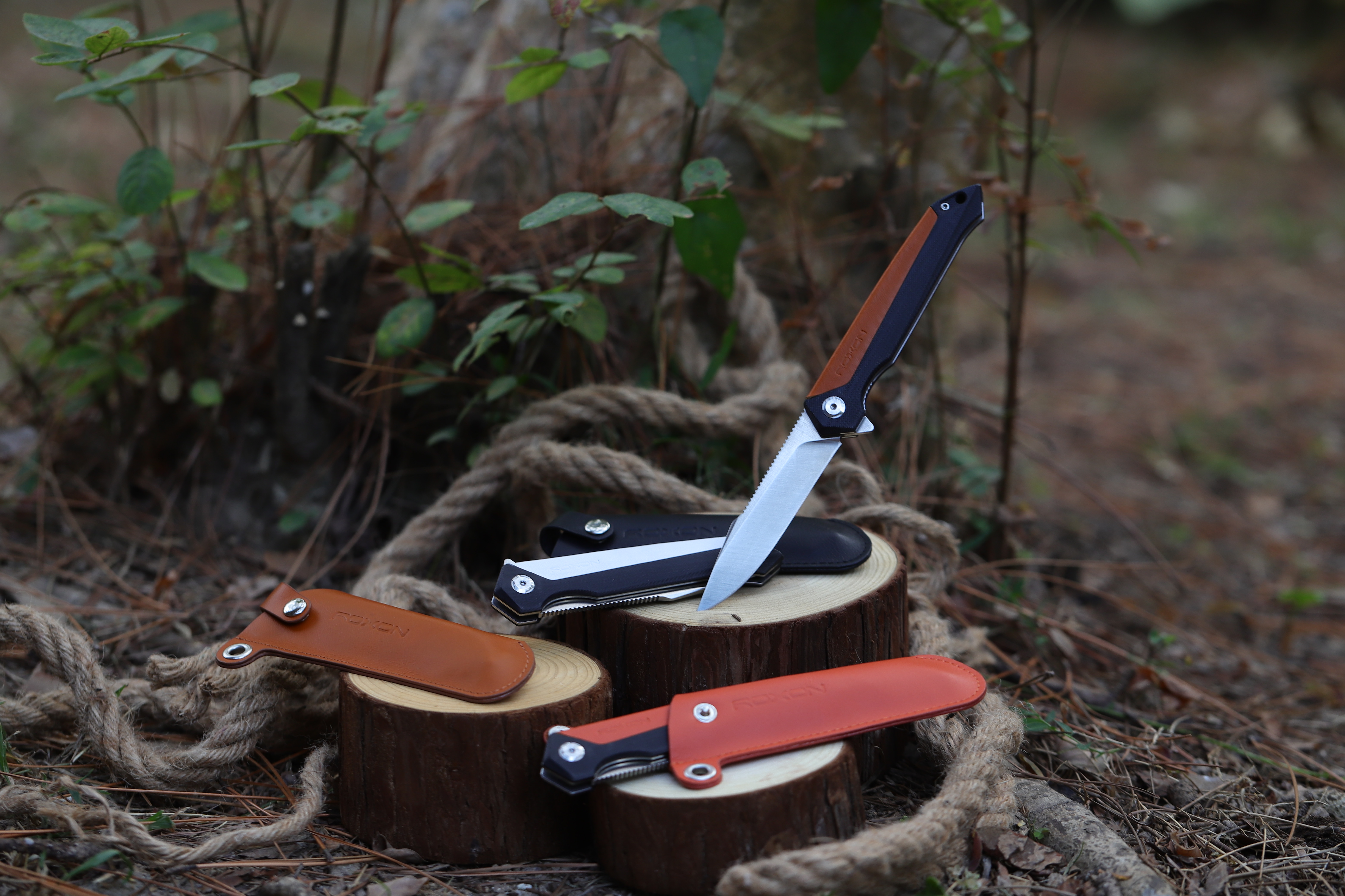 Ніж складний Roxon K3 лезо 12C27, коричневий